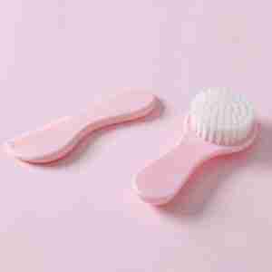 Set peineta y cepillo de pelo rosado